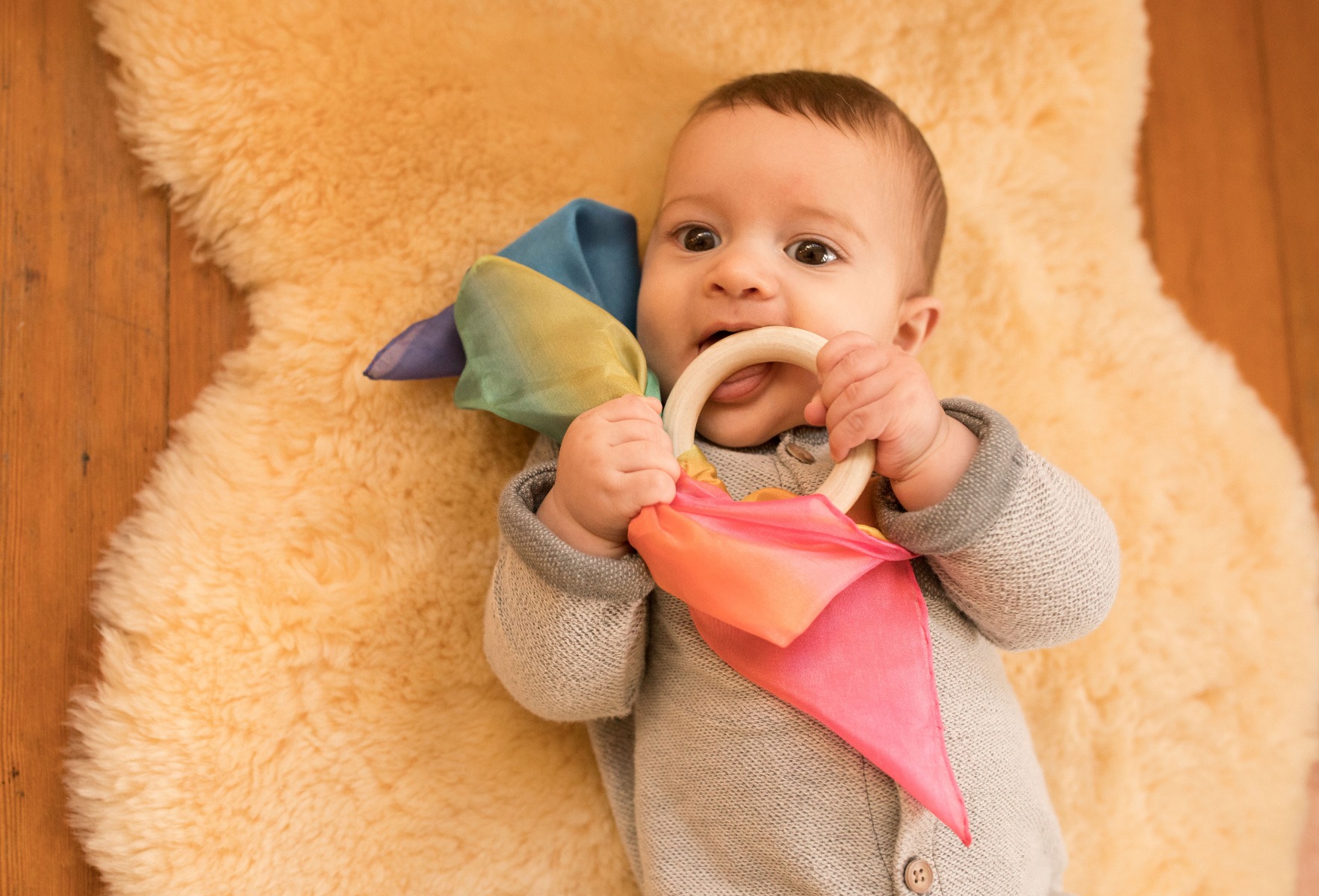 Sarah's Silks teething ring rainbow image